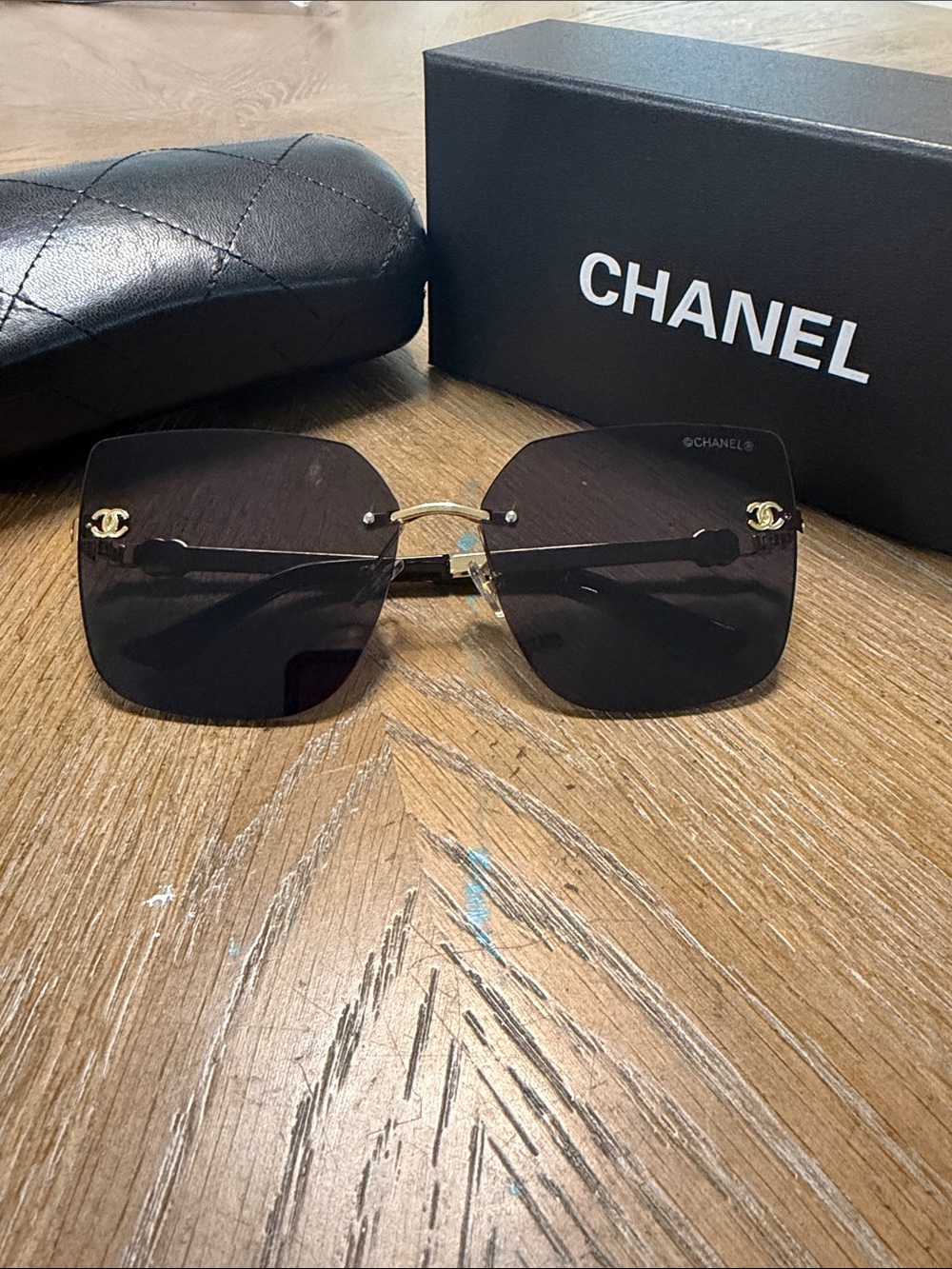 CHANEL Black Rimless Square Sunglasses with Gold CC Accents - Picture 2 of 10